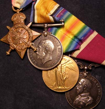 1914 Star Medal Trio & Long Service Medal. Scots Guards.POW.